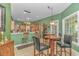 Bright breakfast nook with a table and chairs, adjacent to the kitchen area at 5303 Pheasant Dr., North Myrtle Beach, SC 29582