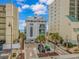 Beautiful coastal building featuring a paved parking area and balconies with ocean views at 5303 Pheasant Dr., North Myrtle Beach, SC 29582