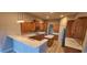 Spacious kitchen featuring granite countertops, wooden cabinets, and stainless steel appliances at 5303 Pheasant Dr., North Myrtle Beach, SC 29582