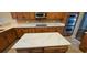 Modern kitchen with a center island, granite countertops, and wooden cabinets at 5303 Pheasant Dr., North Myrtle Beach, SC 29582