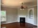 Living room featuring a fireplace, ceiling fan, and built-in shelving at 5303 Pheasant Dr., North Myrtle Beach, SC 29582