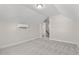 Neutral carpeted bonus room with mini split system and access to the attic at 639 Carter Reid Ct., Longs, SC 29568