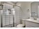 Modern bathroom with glass enclosed shower, sleek toilet and modern vanity at 113A 12Th Ave. S, Surfside Beach, SC 29575
