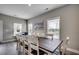 Spacious dining area with large table, perfect for Gathering gatherings and dinner parties at 113A 12Th Ave. S, Surfside Beach, SC 29575