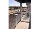 Exterior balcony view features white railing, natural light, and community street view at 780 Maxine Ct. # 8A, Myrtle Beach, SC 29577