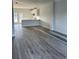 Bright living room with hardwood floors and an open layout flows into kitchen and backyard at 780 Maxine Ct. # 8A, Myrtle Beach, SC 29577