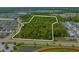 Discover a spacious, tree-filled lot ready for your dream home or development in a desirable community at 821 Rebecca Ln. # 6C, Myrtle Beach, SC 29577