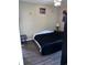 Bedroom with double bed, dark comforter, and wall art at 1286 River Oak Dr. # 8-I, Myrtle Beach, SC 29579