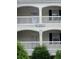 Building 8 exterior showing entrance and balconies at 1286 River Oak Dr. # 8-I, Myrtle Beach, SC 29579
