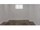 Clean basement space with neutral colors, offering potential for customization at 526 Dogwood Dr. N, Garden City Beach, SC 29576