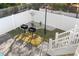 Backyard featuring two charcoal grills, a small tree, and a white privacy fence at 514 Vista Dr., Murrells Inlet, SC 29576