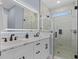 Bathroom featuring double vanity, marble counters, and a tiled glass enclosed shower at 514 Vista Dr., Murrells Inlet, SC 29576