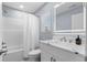 Bathroom with a sleek vanity, shower, and modern fixtures at 514 Vista Dr., Murrells Inlet, SC 29576