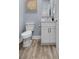 Modern bathroom featuring a white vanity, toilet, and stylish decor at 514 Vista Dr., Murrells Inlet, SC 29576