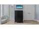 Bedroom with a black dresser, mounted TV, and a comfortable seating area at 514 Vista Dr., Murrells Inlet, SC 29576