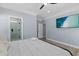 Bedroom featuring ensuite bathroom and a sleek black ceiling fan at 514 Vista Dr., Murrells Inlet, SC 29576