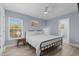 Well-lit bedroom featuring a bed, a ceiling fan, and natural light at 514 Vista Dr., Murrells Inlet, SC 29576