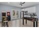 Spacious recreational area featuring kitchenette, arcade games, and table for seating at 514 Vista Dr., Murrells Inlet, SC 29576