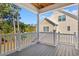 Balcony offering picturesque views of the lush yard and neighborhood at 132 Oak Bay Dr., Georgetown, SC 29440