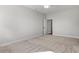 Bright bedroom with neutral carpet, ceiling fan, and connecting room provides a relaxing space at 132 Oak Bay Dr., Georgetown, SC 29440