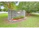 Community entrance with stone wall and landscaping at 2201 John Henry Ln., Myrtle Beach, SC 29579