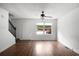 Bright entryway with hardwood floors, staircase, and view to the backyard at 2201 John Henry Ln., Myrtle Beach, SC 29579