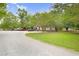 Gravel driveway and parking area near house at 2201 John Henry Ln., Myrtle Beach, SC 29579