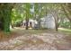 Three-unit building, side view, with green doors and stairs at 2201 John Henry Ln., Myrtle Beach, SC 29579