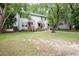 Three-unit building; features green doors and American flag at 2201 John Henry Ln., Myrtle Beach, SC 29579
