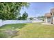 Large backyard with a privacy fence and green grass, perfect for outdoor activities and relaxation at 2513 Hunters Trail, Myrtle Beach, SC 29588