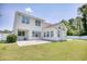 Two story home with a concrete patio and spacious backyard at 2513 Hunters Trail, Myrtle Beach, SC 29588