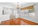 Dining room with hardwood floors and decorative chandelier at 2513 Hunters Trail, Myrtle Beach, SC 29588