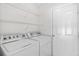 Laundry room with shelving and a modern washer and dryer at 2513 Hunters Trail, Myrtle Beach, SC 29588