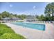 Community pool with lounge chairs and covered area, surrounded by greenery, offering a refreshing escape at 2513 Hunters Trail, Myrtle Beach, SC 29588