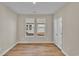 Bright bedroom with two windows and wood flooring at 301 Broughton Dr., Myrtle Beach, SC 29579