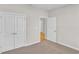 Bedroom with double door closet and access to another room at 301 Broughton Dr., Myrtle Beach, SC 29579