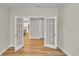 Bedroom with French doors opening to the kitchen at 301 Broughton Dr., Myrtle Beach, SC 29579