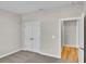 Bedroom with double door closet and access to another room at 301 Broughton Dr., Myrtle Beach, SC 29579