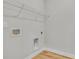 Laundry closet with wire shelving and hook at 301 Broughton Dr., Myrtle Beach, SC 29579