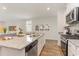 Kitchen features granite countertops, white cabinets and stainless steel appliances at 1127 Flintshire Dr., Myrtle Beach, SC 29579