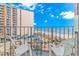 Balcony with seating overlooking the beach and resort amenities at 1605 S Ocean Blvd. # 410, Myrtle Beach, SC 29577
