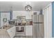 Contemporary kitchen featuring stainless steel appliances, updated cabinetry, and granite counters at 1605 S Ocean Blvd. # 410, Myrtle Beach, SC 29577