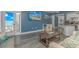 Bright living room with large TV, a view to the balcony, and seamless access to the kitchen at 1605 S Ocean Blvd. # 410, Myrtle Beach, SC 29577