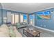 Bright living room featuring comfortable seating, a large window view, and stylish decor at 1605 S Ocean Blvd. # 410, Myrtle Beach, SC 29577
