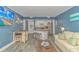 Inviting condo featuring an open floor plan, kitchen bar, and coastal-themed decor at 1605 S Ocean Blvd. # 410, Myrtle Beach, SC 29577