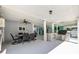 Outdoor living area with dining, grill, bar and stairs to main level at 615 N 17Th Ave. N, Surfside Beach, SC 29575