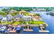 Aerial view showcases the waterfront homes with private docks providing easy access to the channel at 144 Waterway Crossing Ct., Little River, SC 29566