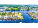 Aerial view showcasing a home's waterfront location with dock, channel access and neighborhood at 144 Waterway Crossing Ct., Little River, SC 29566