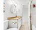 Small bathroom with single vanity, tub, and shower at 2500 Ocean Blvd. N # 1014, North Myrtle Beach, SC 29582