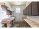 Functional basement space with workbenches and storage at 705 White Oak Dr., Johnsonville, SC 29555